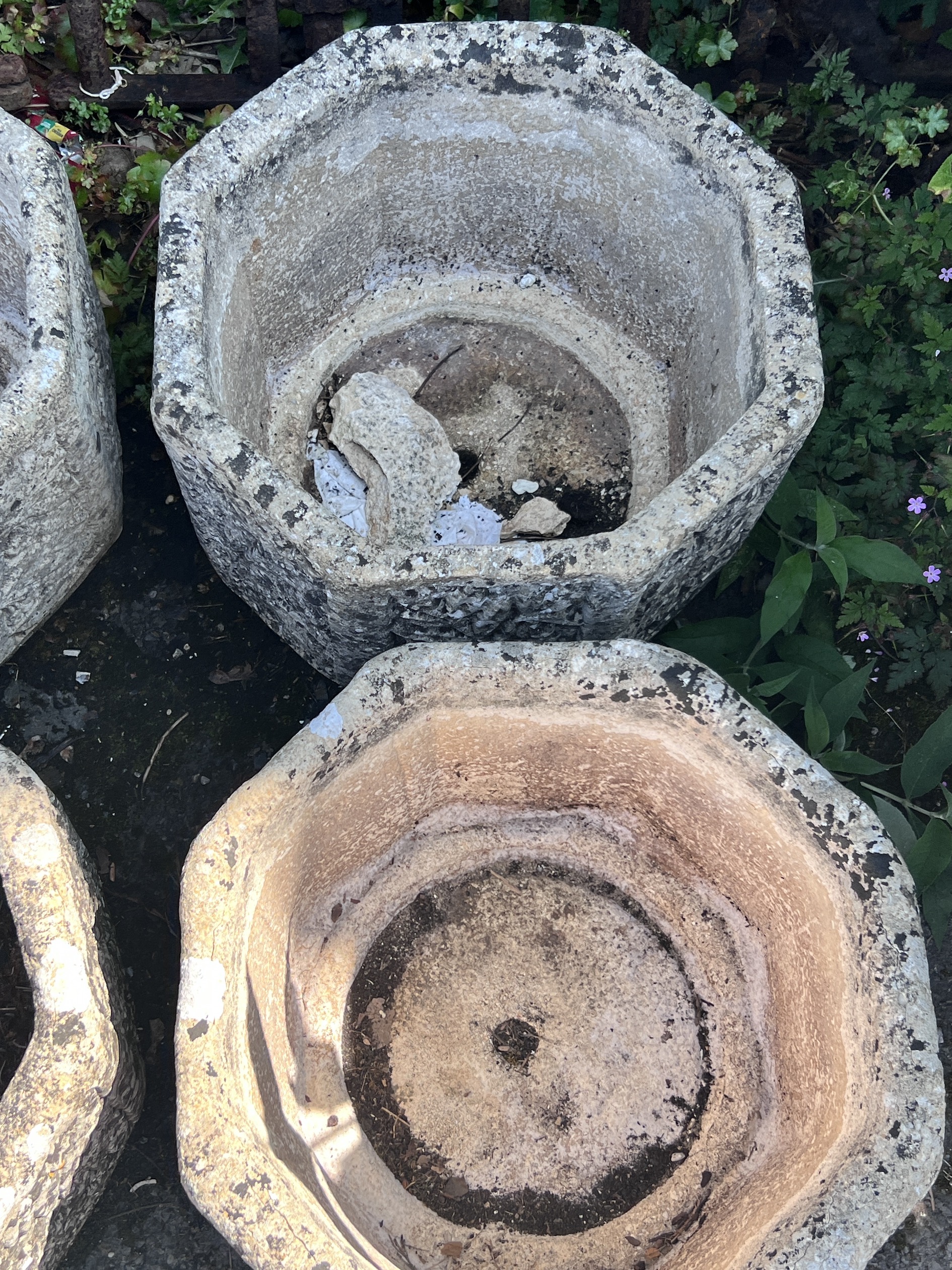 A set of four reconstituted stone hexagonal garden planters, width 40cm, height 29cm